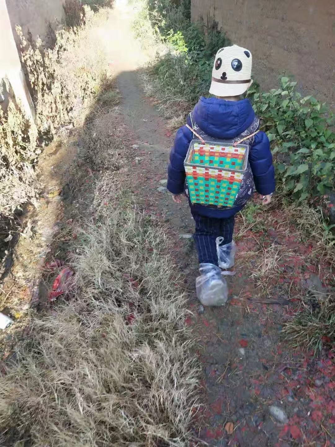 A child carrying a basket